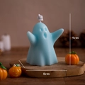 Light blue ghost scented candle 9cm x 8cm on wood slice with Halloween ornaments - Chubby Lake Blue (Rosemary Mint)