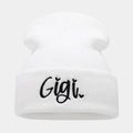 Detailed view of the black Gigi embroidery on a white folded cuff knit beanie - One Size / White