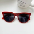 Retro deep red oval sunglasses for women with dark lenses and minimalist frame design - Burgundy