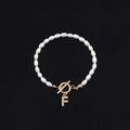 Elegant pearl bracelet with golden OT clasp and sparkling crystal letter F pendant - Gold Letter F (SL2013)