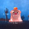Lichtgevende roze varkensfiguur van hars met kroon en glitters, 2,7 x 2,5 cm - Lichtgevend Halloween Varken