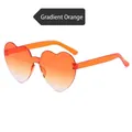 Fashionable heart-shaped rimless sunglasses with gradient orange lens and transparent temples - Gradient Orange
