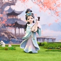 Detail of Chinese ancient style doll with pipa instrument on a garden background - Wang Zhaojun Figurine Large