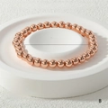 Detail view of 6mm rose gold elastic bead bracelet showing 17cm inner diameter and 24g weight - 6mm / Rose Gold