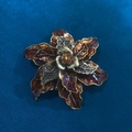 Vintage gold flower brooch with brown petals and rhinestones on a navy velvet background - Champagne Clematis Style