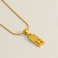 Minimalist gold rectangle necklace featuring a raised letter H sandblasted pendant - Letter H