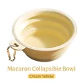 Collapsible TPE pet bowl in cream yellow with metal carabiner for outdoor travel - Creamy Yellow