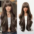Detail view of 24-inch long wavy wig with air bangs and blonde highlights on brown hair - Dark Coffee with Light Gold Highlights