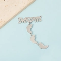 Polished MOM pendant with rhinestone heart and three dangling metal baby footprints - Silver Tone MOM with Triple Feet