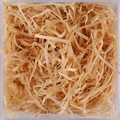 Light brown raffia shredded paper filler for gift boxes in a clear square container - Tan