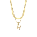Gold double-layer chain necklace featuring pearl-inlaid letter H pendant on snake chain - Letter H