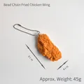 Portachiavi realistico a forma di ala di pollo fritto con finitura dorata e catenella - Ala di Pollo Catenina a Sfere