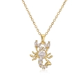 Gold plated necklace featuring a scorpion pendant inlaid with sparkling white zircons - Gold Scorpion