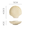 Beige speckled shell-shaped stoneware dish, dimensions 13cm x 12.8cm x 3cm - Shell Shaped Sauce Dish