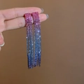 Handheld view of luxury gradient rhinestone fringe earrings in pink and purple colors - Rose Purple Blue Gradient Tassel (DTE1616820RO-BU)