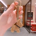 Portachiavi bulldog con strass champagne brillanti, anello dorato e cinturino in pelle - Oro