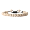 Detailed view of white turquoise beads with black braided cord and adjustable knot - Howlite