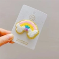 Close-up of rainbow plush hair clip with colorful embroidery and gold glitter edge - Colorful Pink Rainbow Hair Clip (Single)