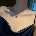 Elegant 18K rose gold plated titanium double ring necklace with sparkling crystals - Necklace / Gold