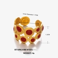 Golden stainless steel geometric ring featuring red enamel circles and matte finish details - Red