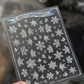 Pegatinas de uñas láser plateadas con copos de nieve y mariposas estilo invierno - KX-496 Copo de Neve Luna Estrella Plata Láser / Efecto Láser de Fragmentos de Vidrio