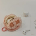 Pink sherpa fleece earphone pouch with zipper and hook on a minimalist white desk - Pink Plaid