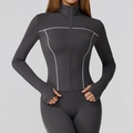 Women's dark grey slim fit yoga jacket with white contrast stitching and thumb holes - S / Volcanic Gray