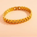 Macro shot of gold stainless steel watch-style bracelet with pavé crystal settings - Gold with Zirconia
