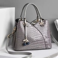 Gray crocodile embossed glossy tote bag with metal handles and cherry pendant charm - Gray