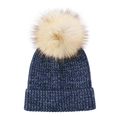 Detail of navy knit beanie showing ribbed texture and a large fluffy faux fur pompom ball - Navy White