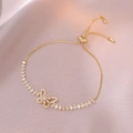 Adjustable gold butterfly bracelet with micro-pave zircons and flexible slider clasp - Butterfly Style (TS0085) / Gold