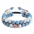 Detail of double-layer woven bracelet with blue lava stone and marble-textured beads - Blue Lava Stone and Marble Pattern Stone