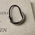 Detail of high-elastic black hair tie with polished silver curved metal geometric ornament - Semi-Circle Silver (D-5336-8)