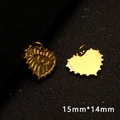 Macro detail of 15mm gold heart charm featuring evil eye relief and mirrored back - P00171-Evil Eye Texture Heart
