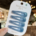 Juego de cuatro pinzas para el cabello azules con purpurina para niñas en tarjeta - Azul