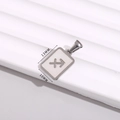 Silver Sagittarius zodiac pendant with white inlay, size 13x10mm on a textured surface - Sagittarius / 10*13mm
