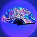 Bamboo folding fan with neon mandala pattern on black frame for stage performance - Mandala Eye UV Glow A35