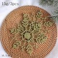 Three pieces of 16.5cm gold glitter snowflake ornaments on a festive rustic background - 15CM Gold Snowflake