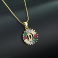 Gold plated initial D necklace with colorful cubic zirconia halo on black background - Gold Plated Rainbow Zirconia Letter D