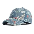 Berretto da baseball in denim lavato da donna con stampa floreale vintage e protezione solare - Regolabile / Blu Medio