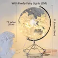 Modern grey globe lamp with internal LED fairy lights on a silver geometric metal base - Globe - Silver + Light String