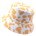 Reversible bucket hat featuring orange cow print on a white canvas background - 58cm / Orange and White Cow Print