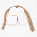 Macro shot of blank white paper gift tags with heart cut-out and natural twine bundle - 2-White Heart Cut-out