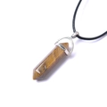 Macro detail of hexagonal tiger eye stone pendant with silver clasp on black cord - Tiger Eye Stone Bracelet