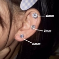 Silver magnetic zircon ear clips for men in 6mm, 7mm, and 8mm sizes shown on ear - Shiny Magnetic 5mm/Single Piece