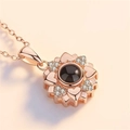 Rose gold projection necklace featuring heart-shaped petals and sparkling zircon stones - Sunflower Rose Gold