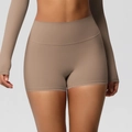 Detail showing the seamless high waist and squat-proof fabric of the coffee workout shorts - S / Mocha Brown