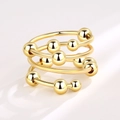Drehbarer goldener Perlenring mit dreilagigem Design zur Linderung von Angstzuständen - Einstellbar Offen / Gold