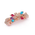 Detailed macro of rose gold bow hair clip with crystal flowers and colorful gemstones - Style C / Rainbow