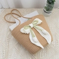 Handwoven straw tote bag in light brown with a large green bow and tulip charm - Khaki with Lily